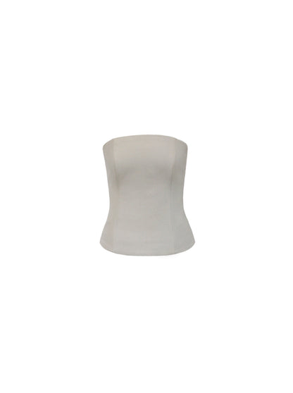 White strapless top on a white background