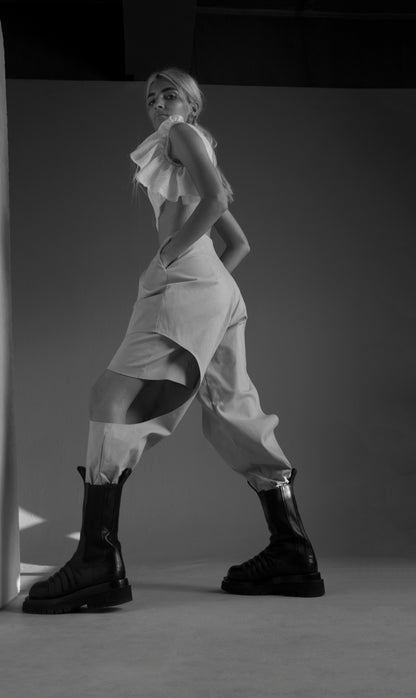 Nude gabardine two layered pant/shorts with side cut outs.