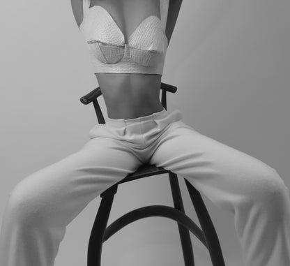 Pearl white faux crocodile leather bralette with a hook and eye closure.  