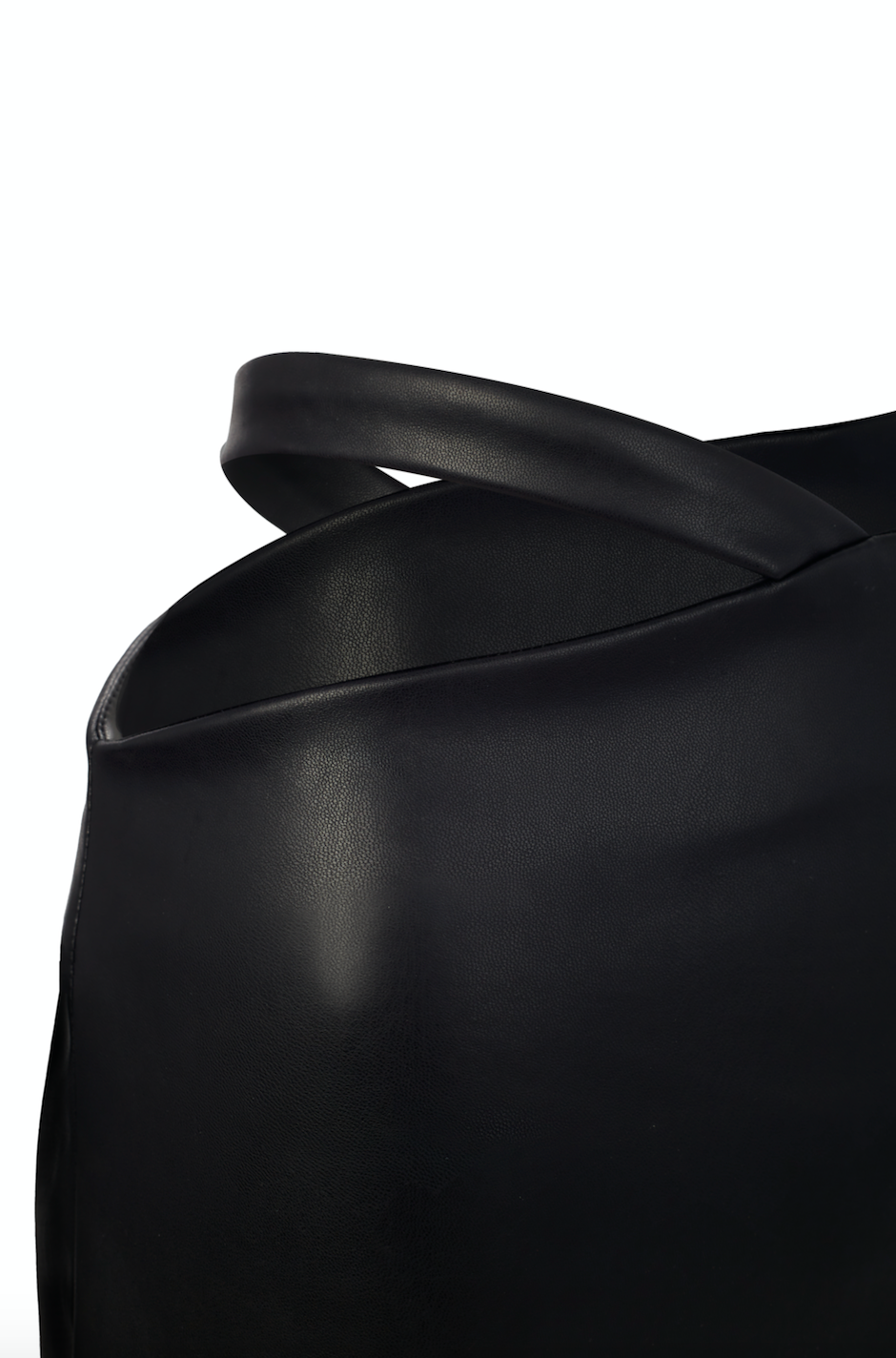 Asymmetrical faux leather midi skirt with waist band.