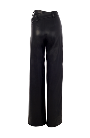 Asymmetrical double waistband pants made with black faux leather.   