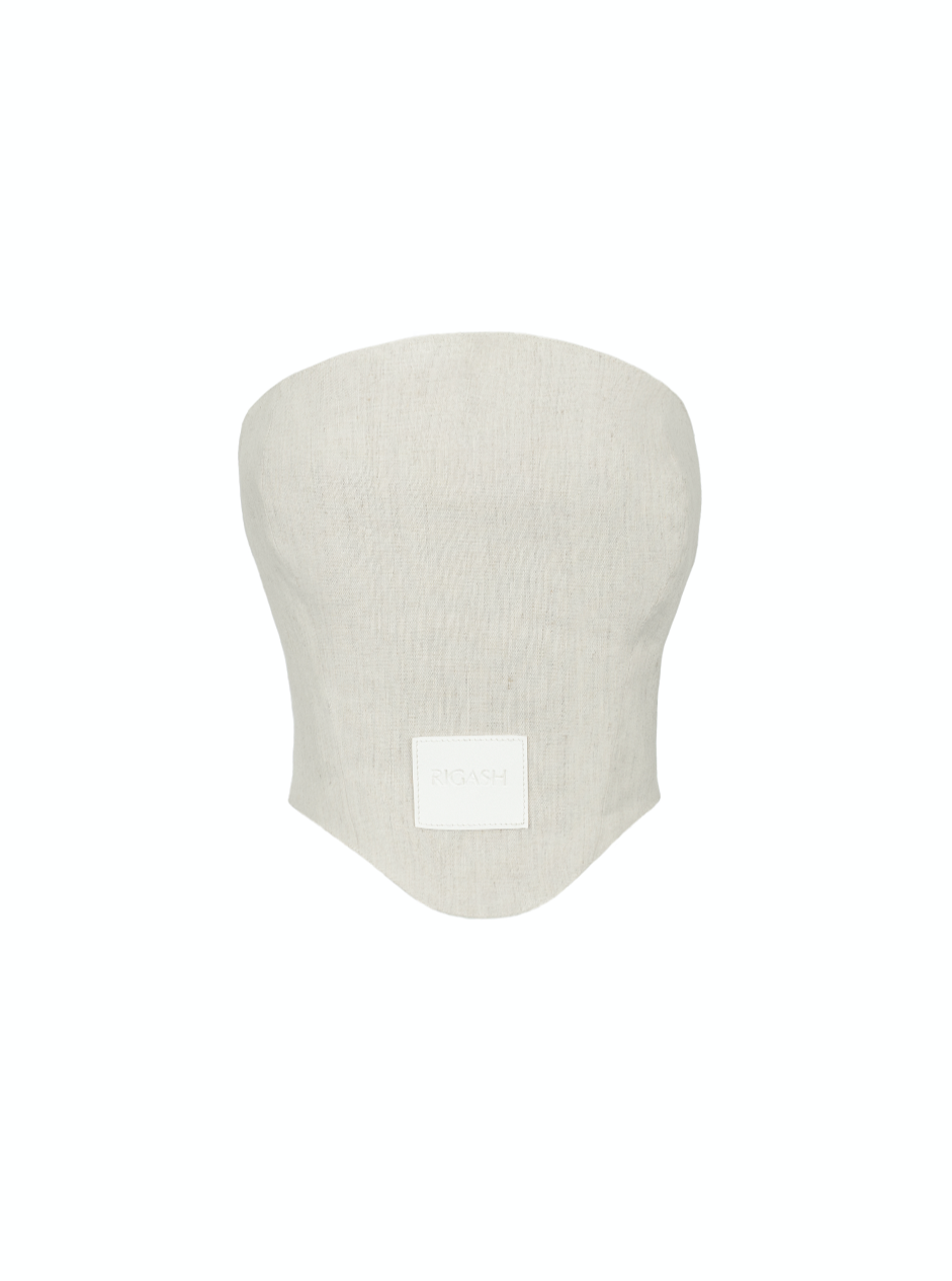 Dipped hem corset top with a round strapless neckline. Back panels held together by brown leather belt. Visible front leather tag with embossed logo print. 